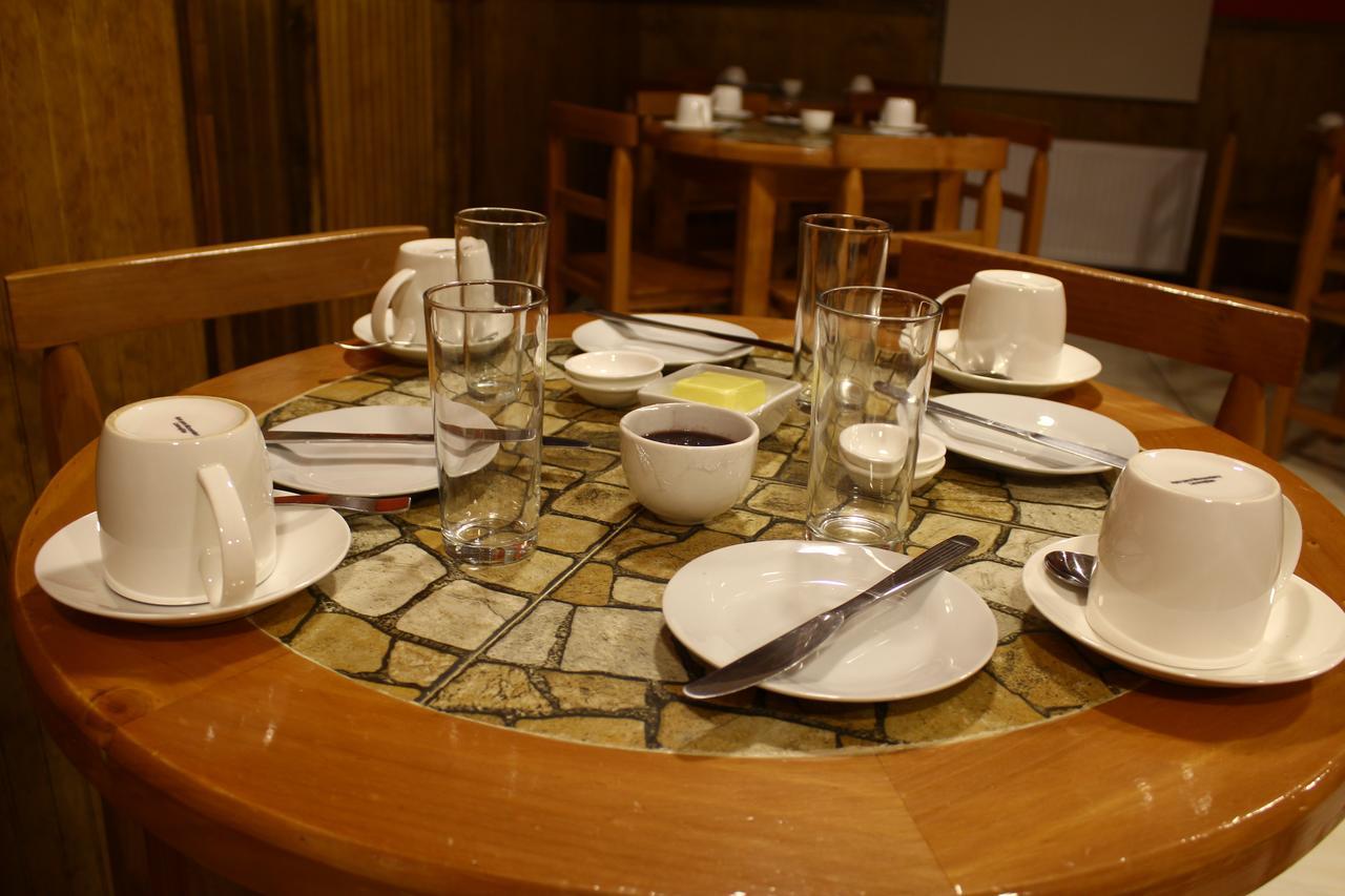 Hostal America En Пуэрто-Наталес Экстерьер фото